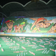 Illustration for article titled The Amazing, Colorful Flip Card Propaganda Mosaics of North Korea